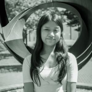 A headshot of Angelika Santero, the Social Media and Graphic Designer for ETHEL