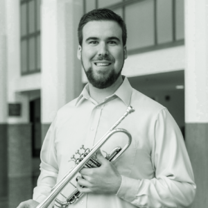 A headshot of Dr. Eric Millard, the Faculty Director for ETHEL