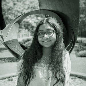 A headshot of Praneeta Veluri, the Editor-in-Chief for ETHEL